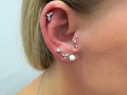 Helix und Tripletraguspiercing